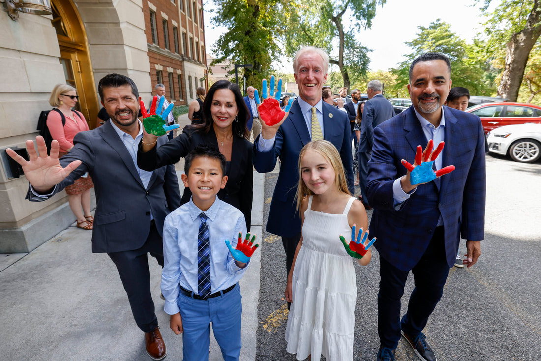 Hyundai Hope on Wheels honors researchers and hospitals that receive grants with handprint ceremonies, like this one at George Lombardi Comprehensive Cancer Center in Washington, D.C. in September 2025. (Pictured left to right, back row: Executive Director John Guastaferro, Chief Operating Officer Claudia Márquez, Board Vice Chair Kevin Reilly, Hyundai Motor North America President and CEO Randy Parker. Front row from left: Hyundai Hope on Wheels Youth Ambassadors Jackson Trinh and Emmy Cole.)