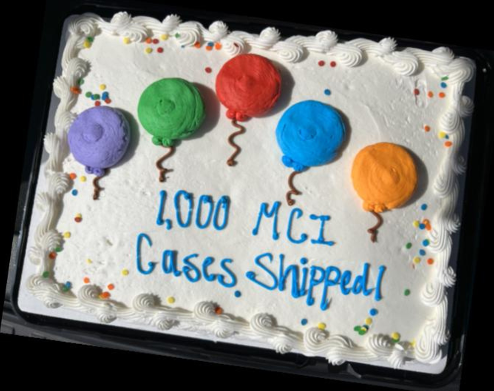 The BPC team celebrates the milestone of 1,000 MCI cases shipped.